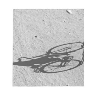 Myamar, Bagan, Young boy riding a huge bike and Notepad