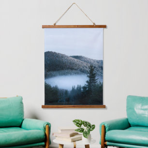 Mysterious fog trapped in winter spruce forest hanging tapestry