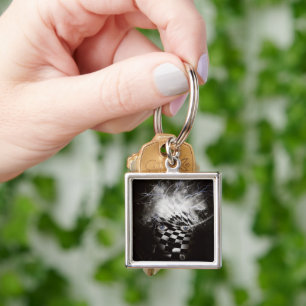 Mystic mask with time spirals key ring