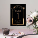 Mystical Black Gold Sun Moon Astronomy Wedding Table Number<br><div class="desc">Mystical Black Gold Sun Moon Astronomy Wedding Table Numbers features gold sun, moon and stars with a golden frame on a black background. Inside is your custom wedding invitation information. Personalise by editing the text in the text boxes. Designed for you by Evco Studio www.zazzle.com/store/evcostudio NOTE: Please customise with table...</div>