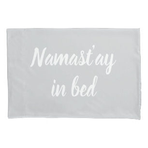 Namastay in bed brush script lettering light grey pillowcase