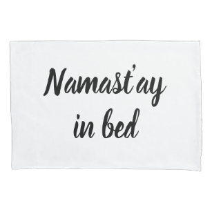 Namastay in bed brush script lettering pillow case