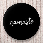 Namaste | Black Yoga Modern Spiritual Meditation 6 Cm Round Badge<br><div class="desc">Simple, stylish "namaste" quote art design in modern minimalist handwritten script typography on a bold black background. The slogan can easily be personalized with your own words for a perfect gift for a yoga bunny or pilates lover! Namasté literally means "greetings to you." In the Vedas, namaste mostly occurs as...</div>