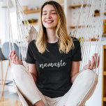 Namasté | Modern Black Meditation Spiritual Yoga T-Shirt<br><div class="desc">Simple, stylish "namaste" quote art design in modern minimalist handwritten script typography. The slogan can easily be personalised with your own words for a perfect gift for a yoga bunny or pilates lover! Namasté literally means "greetings to you." In the Vedas, namaste mostly occurs as a salutation to a divinity....</div>