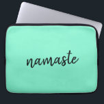 Namaste | Neo Mint Green Modern Yoga Spiritual Laptop Sleeve<br><div class="desc">Simple, stylish "namaste" quote art design in modern minimalist handwritten script typography on a mint green background. The slogan can easily be personalised with your own words for a perfect gift for a yoga bunny or pilates lover! Namasté literally means "greetings to you." In the Vedas, namaste mostly occurs as...</div>