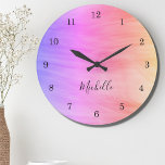Name Monogram Pink Purple Large Clock<br><div class="desc">This colourful Wall Clock is decorated with a swirl pattern in pink and purple.
Easily customisable with your name or monogram.
Use the Customise Further option to change the text size,  style or colour if you wish.</div>