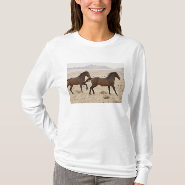 Namibia, Aus. Wild horses running on the Namib T-Shirt (Front)
