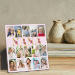 Nana Gold Letters 15 Vertical Photo Collage Pink Plaque<br><div class="desc">Gorgeous photo gift for your nana. The design features floral letters for "nana" which is printed in gold and decorated with pink lily flowers. The photo template is set up for you to add 15 of your favourite photos, all of which are displayed in vertical portrait format. This grid style...</div>