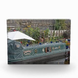 Narrow boat and flower garden photo block