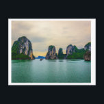 Narrow Passage through the Rocks  Postcard<br><div class="desc">A photo of two tour boats going through a channel on the glistening emerald waters between the massive limestone rock formations of Ha Long Bay in Vietnam. Ha Long bay is a UNESCO World Heritage Site known worldwide for its natural beauty.</div>