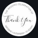 Natasha Handwritten Script Wedding Favour Thank Yo Classic Round Sticker<br><div class="desc">Use these simple yet elegant, black and white stickers on your favours. The minimalist design features your names, wedding date and the words "Thank you" written in a modern sans serif font accented with a handwritten calligraphy script font. Designed to match my stylish Natasha wedding collection. Be sure to browse...</div>