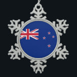 National Flag of New Zealand Snowflake Pewter Christmas Ornament<br><div class="desc">National Flag of New Zealand

New Zealand,  flag,  blue,  red,  union,  country,  national,  official,  symbol,  sovereign,  celebration,  freedom,  independence,  independent,  liberty,  holiday,  icon,  banner,  vector,  accurate,  dimensions,  proportions,  colours</div>