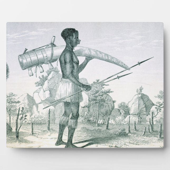 Native carrying a decorated ivory elephant tusk, f plaque (Front)