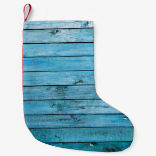 Natural blue wood, textured background. small christmas stocking