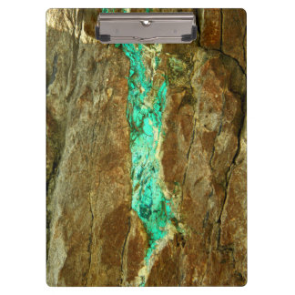 Natural turquoise vein in rough brown stone clipboard