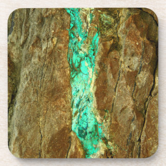 Natural turquoise vein in rough brown stone coaster