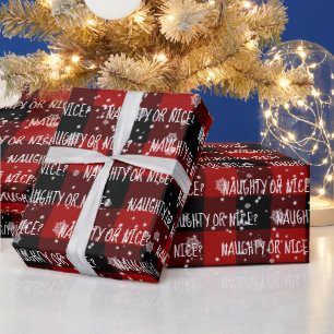 NAUGHTY OR NICE Text and Snowflakes Wrapping Paper
