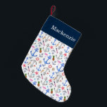 Nautical Beach Summer Pattern Custom Name Small Christmas Stocking<br><div class="desc">This fun,  beach themed stocking adds a touch of the ocean to your holiday decor. Personalise with your name. Design features many beach elements including anchors,  flamingos,  starfish,  pineapples,  lighthouses,  and more.</div>