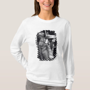 Navaho woman carrying a papoose on her back T-Shirt