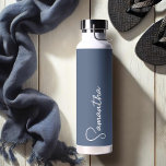 Navy Blue and White Personalised Water Bottle<br><div class="desc">This personalised insulated bottle combines modern style with elegant simplicity, featuring your custom name in white script against a sophisticated navy blue background. Designed to keep drinks cold in summer and warm in winter, this bottle is perfect for the bride, a gift for her, or a stylish companion for yoga,...</div>