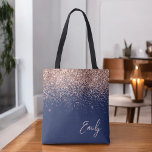 Navy Blue Blush Pink Rose Gold Glitter Monogram Tote Bag<br><div class="desc">Navy Blue and Pink Rose Gold and Blush Pink Faux Sparkle and Glitter Elegant Monogram Book Bag. This Book Bag can be customised to include your initial and first name and given as a gift for Christmas,  Sweet 16 Birthday,  Bridal Shower or a Wedding.</div>