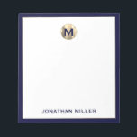 Navy Blue Brushed Gold Monogram Notepad<br><div class="desc">Elevate your note-taking game with this luxurious personalised notepad featuring a brushed metallic gold monogram initial at the top and your name in classic typography at the bottom, elegantly framed in navy blue trim. Perfect for jotting down ideas, taking notes or making lists, this notepad makes a great gift for...</div>