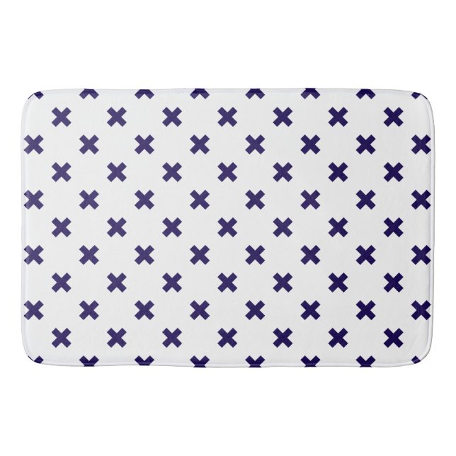 Navy blue cross stitches on white bath mat (Front)