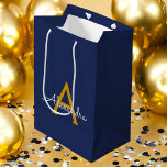 Navy Blue Gold Modern Script Girly Monogram Name Medium Gift Bag<br><div class="desc">Navy Blue and Gold Simple Script Monogram Name Gift Bag. This makes the perfect sweet 16 birthday,  wedding,  bridal shower,  anniversary,  baby shower or bachelorette party gift bag for someone that loves glam luxury and chic styles.</div>