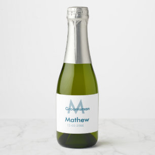 Navy blue groomsman name letter date masculine per sparkling wine label