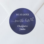 Navy blue heart wedding Save the Date Classic Round Sticker<br><div class="desc">A Save the Date sticker for your wedding. A navy blue background,  white text. The blue colour is uneven. Decorated with a small heart. Personalise and add your names and wedding date.</div>