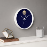 Navy Blue Luxury Gold Monogram Clock<br><div class="desc">Modern Luxury Brushed Metallic Gold Stylish Typography Navy Blue Background White Frame Home Office Kitchen Living Room Bathroom Clock</div>