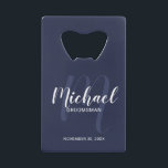 Navy Blue Modern Script Personalised Groomsmen<br><div class="desc">Add a personal touch to your wedding with personalised groomsmen credit card bottle opener. This bottle opener features personalised groomsmen's name in white modern script font style and monogram in light blue modern script font style as background with title and wedding date in white modern sans serif font style on...</div>