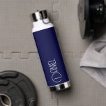 Navy Blue Modern Typography Personalised Water Bottle<br><div class="desc">Trendy, vacuum insulated water bottle that features personalised name in white, modern typography on a navy blue colour background. Personalise bottle by editing name and replacing name with your own as desired. Perfect for a birthday gift, wedding groomsman gift, etc. Select your water bottle style. Select your water bottle style....</div>
