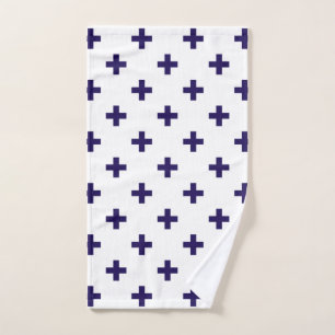 Navy blue polka crosses on white hand towel