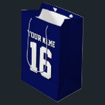 Navy Blue Sports Jersey Team Jersey Medium Gift Bag<br><div class="desc">Preppy Solid Colour Navy Blue Team Jersey / Sports Jersey / Football Jersey / Rugby Jersey with Custom Name Customise this with your own name or team name and a number. You can change the size, colour and placement of the text if you need to make changes, change the colour...</div>