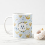 Navy Blue Watercolor Monogram   Hanukkah Pattern Coffee Mug<br><div class="desc">This Festival of Lights / Hanukkah design features a navy blue watercolor monogram in a circle bordered by a wreath with matching navy blue and gold flowers. The background pattern of menorah and Star of David is set on pastel blue. The background may be changed to any colour by choosing...</div>