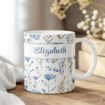 Navy Blue Watercolor Wildflowers Poppy Custom Name Coffee Mug<br><div class="desc">Enjoy your favourite beverage in style with the "Navy Blue Watercolor Wildflowers Poppy Custom Name Coffee Mug." This charming mug showcases a delicate watercolor design featuring navy blue poppies and wildflowers, creating a serene and elegant aesthetic. The intricate floral pattern wraps around the mug, offering a sophisticated yet understated beauty...</div>