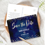Navy Gold Bat Mitzvah Save the Date Modern Script Invitation Postcard<br><div class="desc">Make sure all your friends and relatives will be able to celebrate your daughter’s milestone Bat Mitzvah! Send out this stunning, modern, “Save the Date” announcement postcard. Graphic faux gold foil calligraphy script, Star of David, and confetti, overlay a rich, dramatic, navy blue watercolor background. Personalise the custom text with...</div>