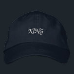 Navy King Text Adjustable Hat Classic Cotton Cap<br><div class="desc">Regal Navy Cotton Cap: Embrace a touch of royalty with this navy cap,  featuring "King" elegantly embroidered on the front. Designed for both style and comfort,  this adjustable cotton hat is a versatile addition to any wardrobe.</div>
