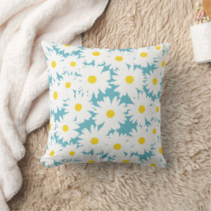 Negative Space Daisies white yellow on blue Cushion