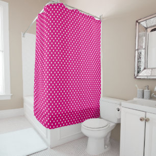 Neon pink shower curtain with polka dots pattern