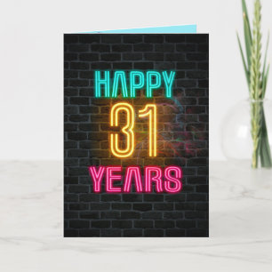 Neon sign on brick for 31st birthday card