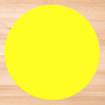 Neon Yellow Solid Colour Round Paper Coaster<br><div class="desc">Neon Yellow Solid Colour.
A bold and electrifying shade of bright yellow that instantly captures attention. This vivid hue evokes the radiant warmth of sunlight and the cheerful energy of a sunflower in full bloom. This striking yellow adds a fresh and dynamic flair.</div>