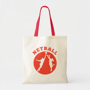 Netball player rebounding for ball tote bag