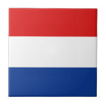 Netherlands Flag Ceramic Tile<br><div class="desc">This design consists of the Dutch flag cleverly reshaped to fit the square tile surface. A decorative and useful item that would make a perfect gift for those who like to remember Netherlands.</div>