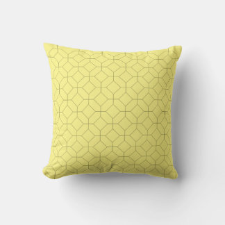 Neutral light yellow pillow with geometric pattern