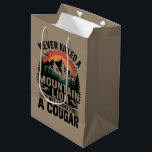 Never Killed A Mountain Lion But I've Choked A Cou Medium Gift Bag<br><div class="desc">Never Killed A Mountain Lion But I've Choked A Cougar quotes</div>