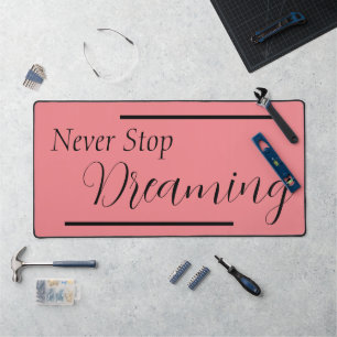"Never Stop Dreaming" Phrase Black Lettering Desk Mat