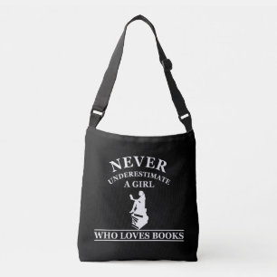 never underestimate a girl who loves books crossbody bag