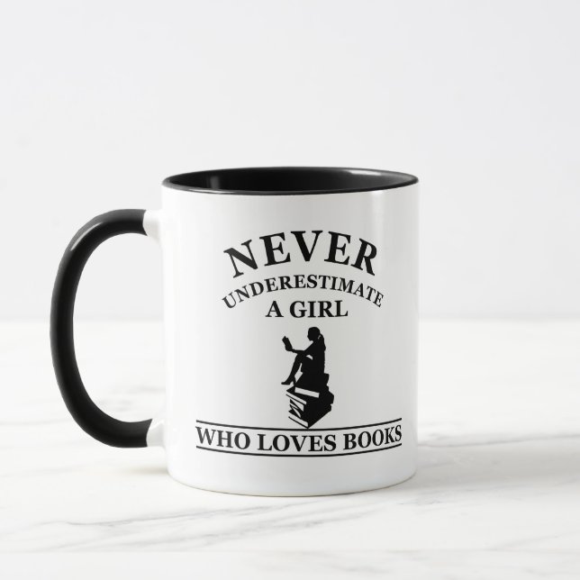 never underestimate a girl who loves books mug (Left)